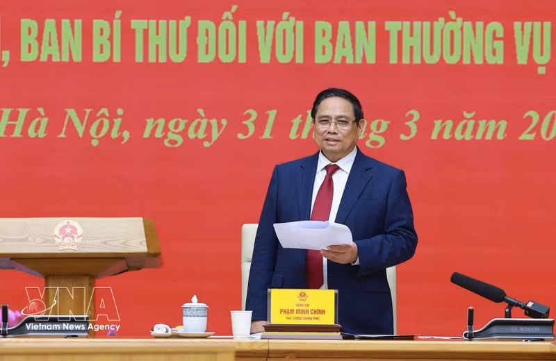 Le Premier ministre Pham Minh Chinh s’exprimant lors de la conférence. Photo: VNA.