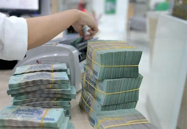 La banque centrale doit garantir la publicité, la transparence et disposer d'un mécanisme strict d'inspection et de supervision pour éviter les risques systémiques. Photo : vietnambiz.vn