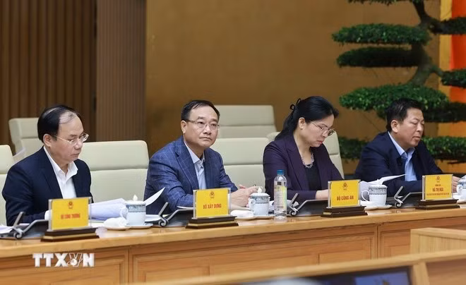 Les délégués assistent à la réunion. Photo: VNA