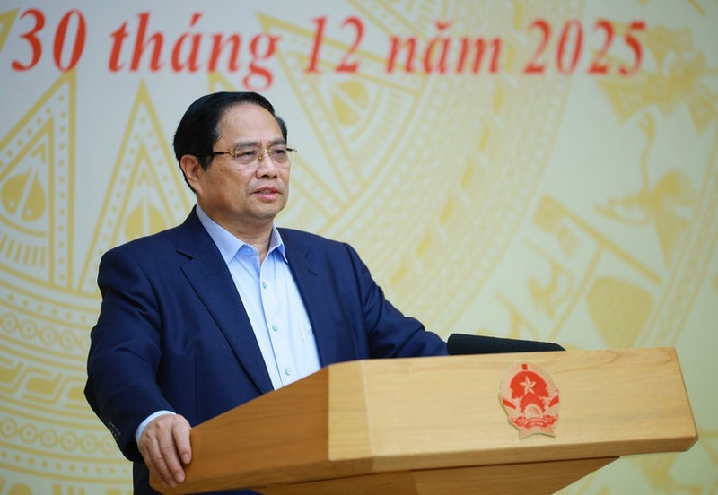 Le Premier ministre Pham Minh Chinh prend la parole lors de la conférence. Photo : VNA.