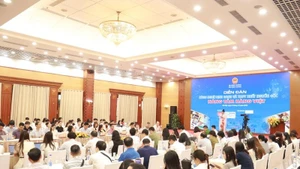 Forum « Technologies d’identification et traçabilité - élever la valeur des produits vietnamiens ». Photo : congthuong.vn