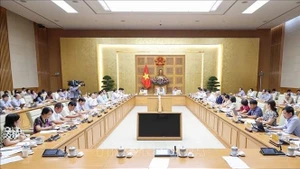Le Premier ministre Pham Minh Chinh lors de la réunion. Photo : VNA.