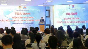 Séminaire : « Le cinéma vietnamien - Un pont vers la coopération et l’intégration internationale ». Photo : baoquocte.vn