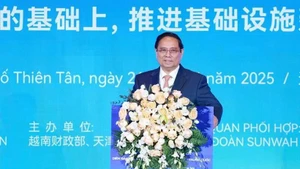 Le Premier ministre Pham Minh Chinh s’exprime lors du Forum de connexion d'affaires Vietnam–Chine à Tianjin. Photo : VNA.
