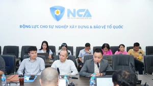 Lors de la table ronde « Journée vietnamienne de la cybersécurité 6/8 - Construire la confiance numérique ». Photo : NDEL