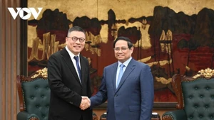 Le Premier ministre Pham Minh Chinh reçoit Hong Tianzhu, président du groupe chinois Texhong. Photo: VOV