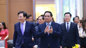 Le Premier ministre Pham Minh Chinh a présidé une rencontre afin de présenter ses vœux de Nouvel An et d'ordonner le déploiement immédiat des missions du Bureau du gouvernement. Photo : VNA.