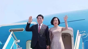 Le président de la République, Luong Cuong et son épouse. Photo: VNA