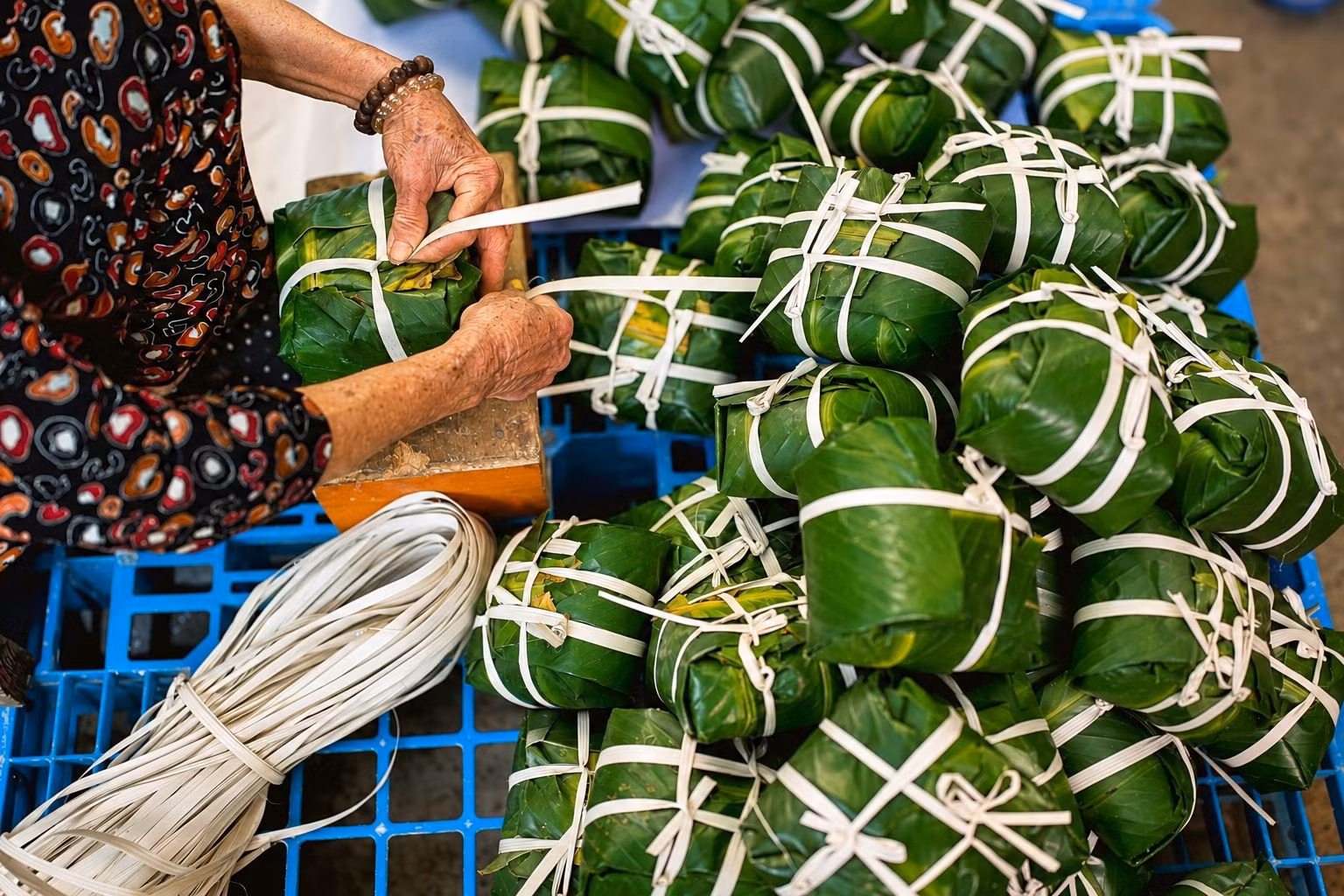 En 2011, le village de Tranh Khuc, spécialisé dans la fabrication du banh chung, a été reconnu comme village de métier traditionnel par le Comité populaire municipal de Hanoi. Photo : langngheviet.