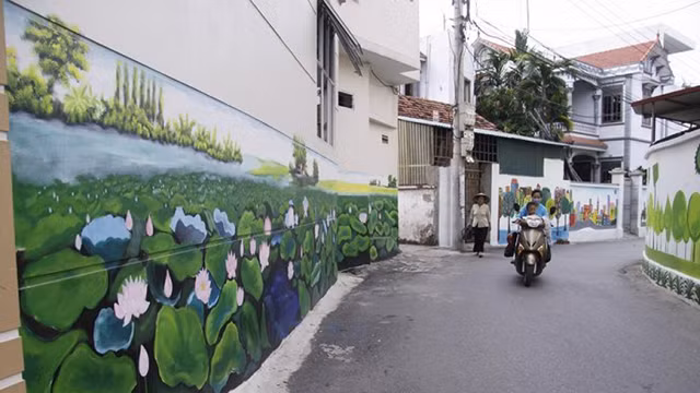 Originalité de la première fresque de rue à Hanoi ảnh 9
