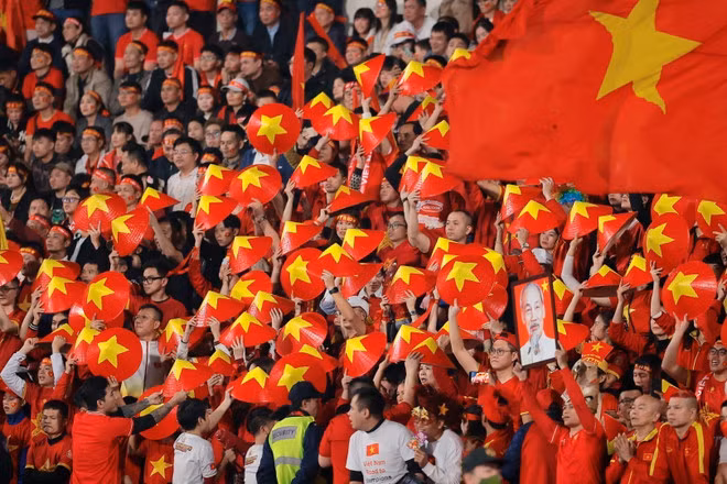 Supporters vietnamiens lors du match. Photo : VNA. Supporters vietnamiens lors du match. Photo : VNA.