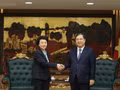 Le vice-Premier ministre permanent Pham Gia Tuc et la vice-présidente d’Apple chargée des opérations de la chaîne d’approvisionnement pour la région Asie-Pacifique, Iris Cui. Photo : VOV.