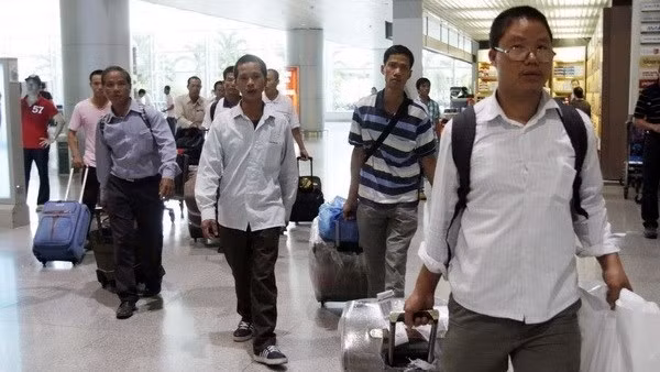 Des travailleurs vietnamiens en République de Corée. Photo: VNA.