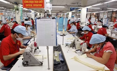 Concernant l’ouverture des marchés en sein de l’APEC, le commerce de ses biens de 1994 à 2014 a connu une croissance de 7,8%, atteignant 18.400 milliards de dollars en 2014. Photo: VNA.