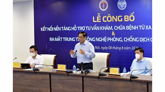 Le Premier ministre Pham Minh Chinh prend la parole lors de la cérémonie. Photo : NDEL.