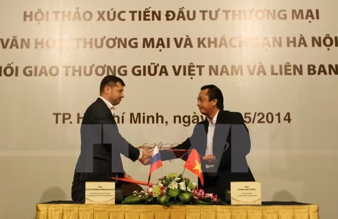 Signature du mémorandum de coopération sur l’investissement vers le Complexe industriel Moscou - Hô Chi Minh-Ville en 2014. Photo: VNA.