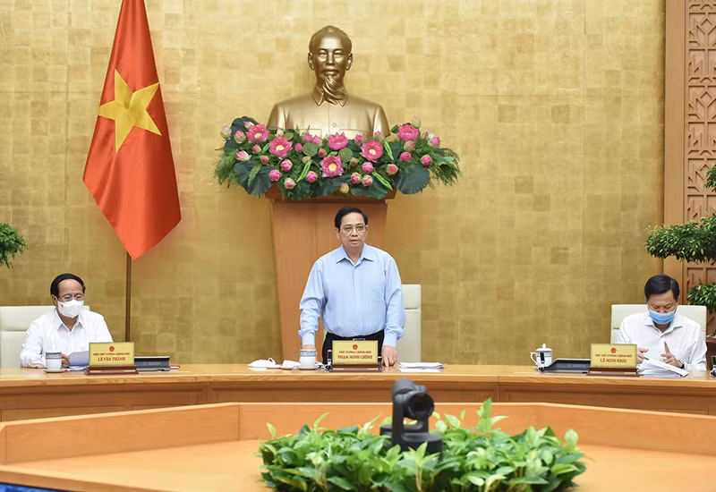 Le Premier ministre Pham Minh Chinh lors de la réunion périodique du gouvernement, tenue en visioconférence. Photo : Trân Hai/NDEL.