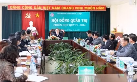 Le gouverneur de la Banque d’État du Vietnam, Nguyên Van Binh, préside la réunion annuelle du Conseil d’administration de la Banque des politiques sociales du Vietnam. Photo: VGP.